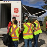 Emergency workers taking a break and enjoying refreshments at the canteen truck
