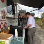 Food and beverages set out in front of the canteen truck.